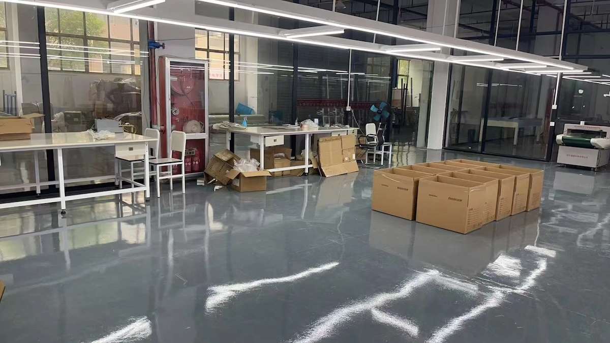 A packing zone with empty cardboard boxes ready for use