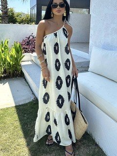 Front view of the cream and black abstract one-shoulder shift dress, showing its silhouette and design details.