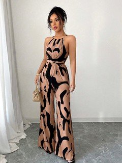 Front view of the peach abstract halter wide-leg jumpsuit, showing its silhouette and design details.