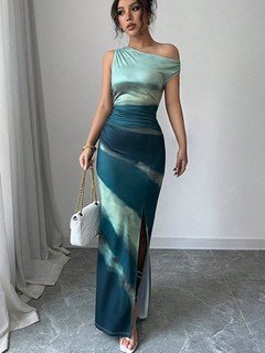 Styled front view of the teal and navy abstract one-shoulder maxi dress, showing its silhouette and design details.