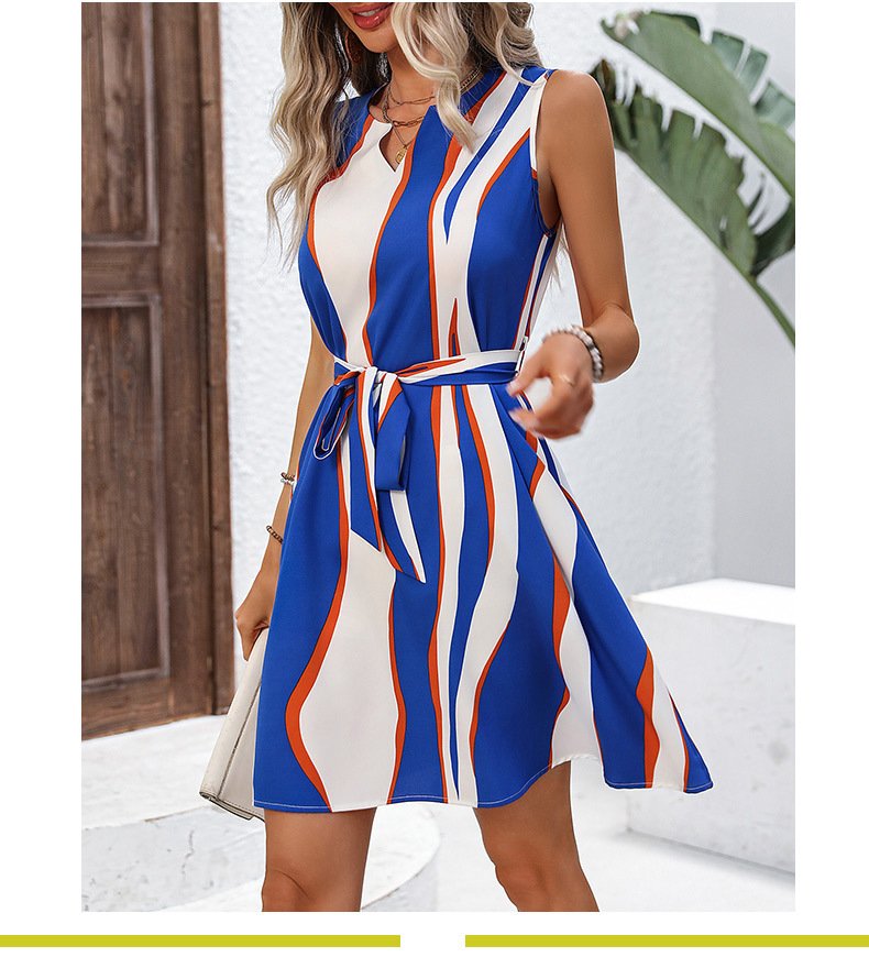 Blue And White Abstract Stripe Belted Dress – Front View Front view of the blue and white abstract stripe belted dress, showing its silhouette and design details.