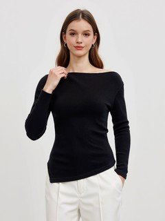 Full-length front view of the black asymmetric boat-neck ruched top, showing its silhouette and design details.