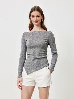 Styled front view of the gray asymmetric boat-neck ruched top, showing its silhouette and design details.