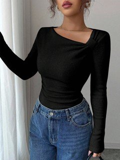 Close-up of the black asymmetric draped-neck top, showing its silhouette and design details.