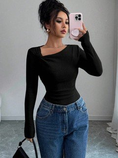 Full-length front view of the black asymmetric draped-neck top, showing its silhouette and design details.