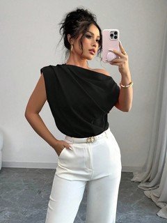 Front view of the black asymmetric one-shoulder draped sleeveless top, showing the silhouette and fit.