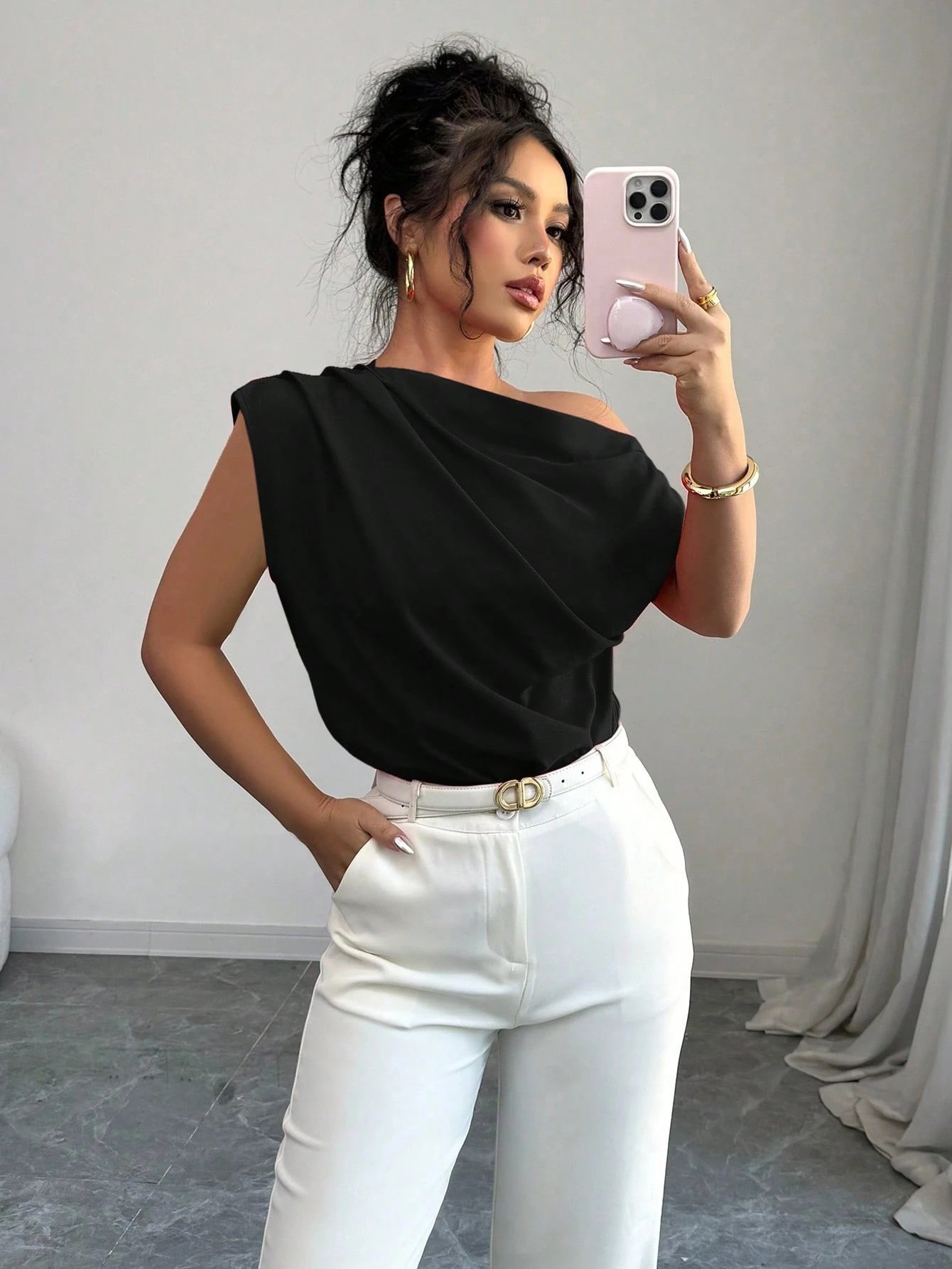 Black Asymmetric One-Shoulder Draped Sleeveless Top – Front View Front view of the black asymmetric one-shoulder draped sleeveless top, showing the silhouette and fit.