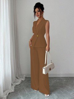 Angled front view of the camel shawl-collar vest and pants set, showing its silhouette and design details.