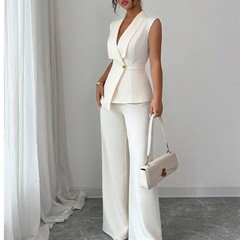 Full-length front view of the ivory shawl-collar vest and pants set, showing its silhouette and design details.