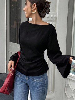 Front view of the black boat-neck bell-sleeve blouse, showing its silhouette and design details.