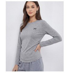 Front view of the gray bow-motif long-sleeve ruched top, showing its silhouette and design details.