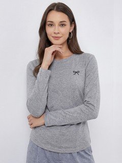 Styled front view of the gray bow-motif long-sleeve ruched top, showing its silhouette and design details.