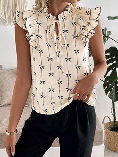 Angled front view of the cream bow print ruffle-sleeve blouse, showing its silhouette and design details.