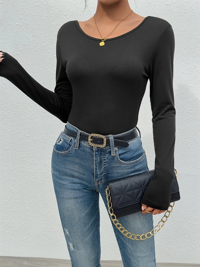 Front view of the black butterfly lace-back long-sleeve fitted top, showing the silhouette and fit.