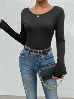 Front view of the black butterfly lace-back long-sleeve fitted top, showing the silhouette and fit.