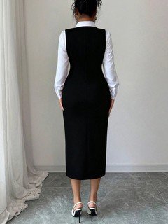 Back view of the black button-front square-neck fitted pinafore midi dress, showing the silhouette and fit.