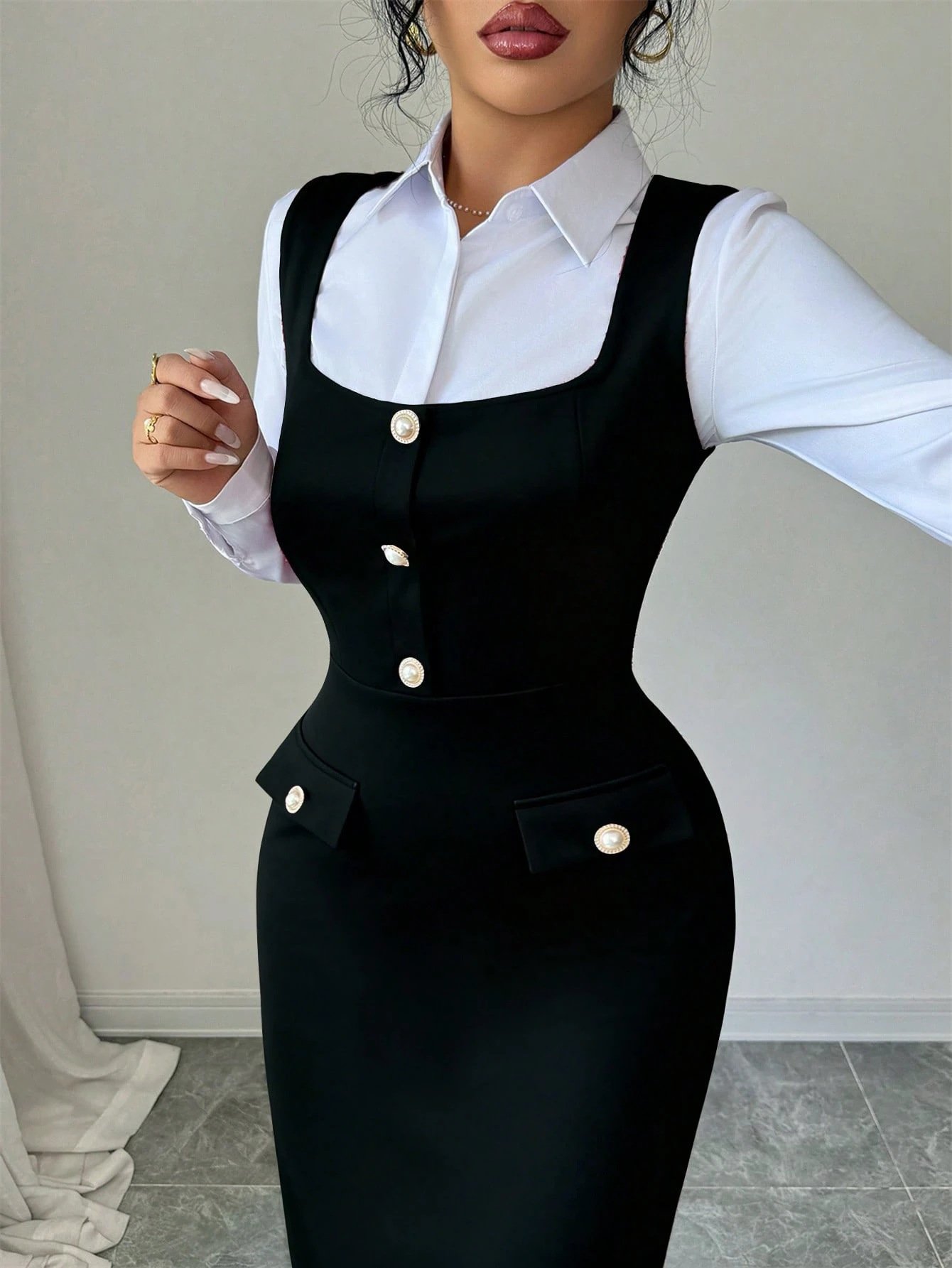 Black Button-Front Square-Neck Fitted Pinafore Midi Dress – Layered Bodice View Layered bodice view of the black button-front square-neck fitted pinafore midi dress, showing the silhouette and fit.