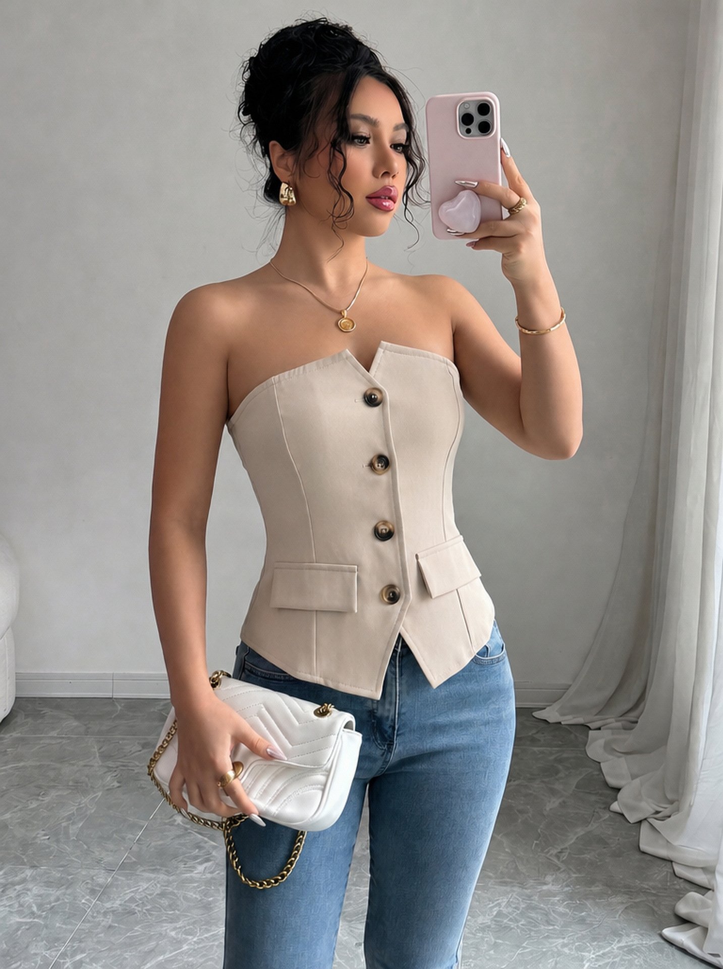 Beige Button-Front Strapless Tailored Corset Top – Front View Front view of the beige button-front strapless tailored corset top, showing the silhouette and fit.