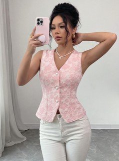 Alternate front view of the pink button-front v-neck tailored vest, showing its silhouette and design details.