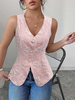 Back view of the pink button-front v-neck tailored vest, showing its silhouette and design details.