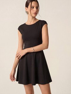 Angled front view of the black cap-sleeve fit-and-flare dress, showing its silhouette and design details.
