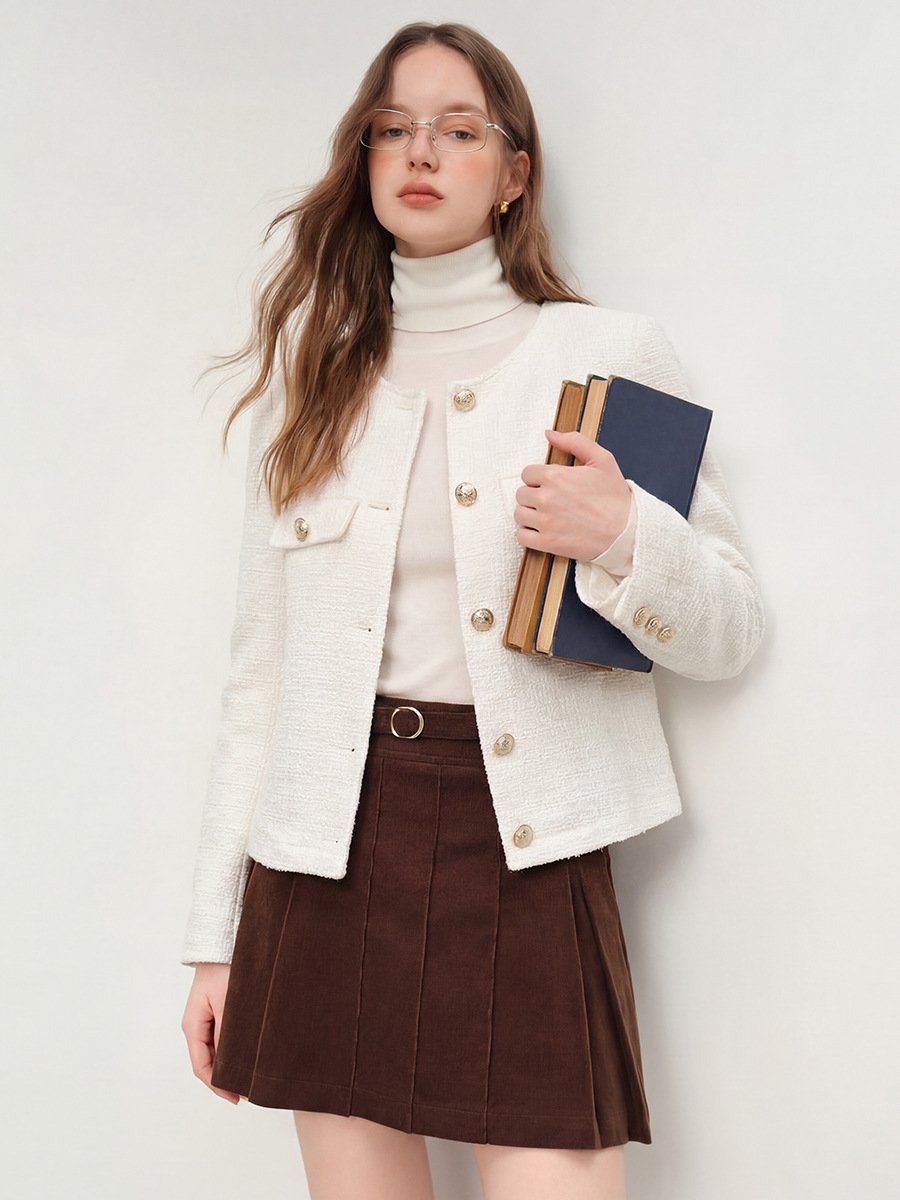 Ivory Collarless Textured Button Jacket – Front View Front view of the ivory collarless textured button jacket, showing its silhouette and design details.