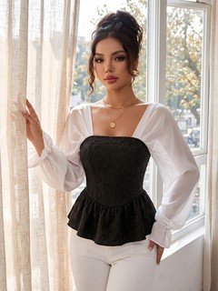 Full length front view of the black contrast mesh puff-sleeve corset peplum top, showing the silhouette and fit.