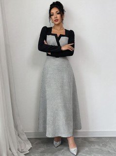 Angled front view of the gray contrast-panel square-neck long-sleeve maxi dress, showing the silhouette and fit.