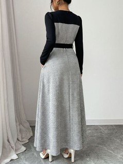 Back view of the gray contrast-panel square-neck long-sleeve maxi dress, showing the silhouette and fit.