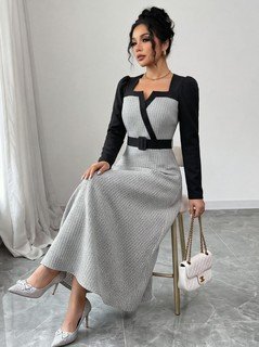 Seated front view of the gray contrast-panel square-neck long-sleeve maxi dress, showing the silhouette and fit.
