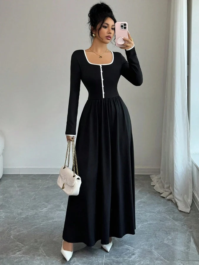 Front view of the black contrast-piping square-neck long-sleeve maxi dress, showing the silhouette and fit.