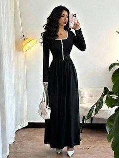 Lifestyle front view of the black contrast-piping square-neck long-sleeve maxi dress, showing the silhouette and fit.
