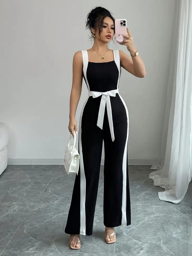 Black And White Contrast-Trim Wide-Leg Jumpsuit – Front View Front view of the black and white contrast-trim wide-leg jumpsuit, showing its silhouette and design details.
