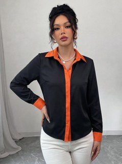 Full length front view of the black contrast-trim long-sleeve button-up shirt, showing the silhouette and fit.