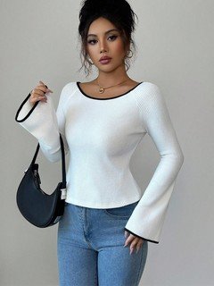 Front view of the white and black bow-back contrast-trim ribbed top, showing its silhouette and design details.