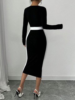 Back view of the black contrast-waist square-neck long-sleeve bodycon midi dress, showing the silhouette and fit.