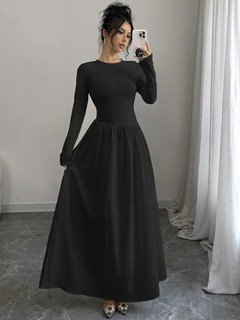 Front view of the black long-sleeve fit-and-flare maxi dress, showing its silhouette and design details.