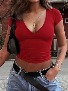 Front view of the red deep scoop-neck fitted crop top, showing its silhouette and design details.
