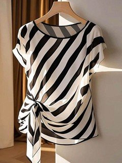Hanger view of the black and cream diagonal stripe side-tie blouse, showing the overall shape.