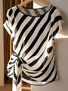 Hanger view of the black and cream diagonal stripe side-tie blouse, showing the overall shape.