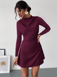 Full-length front view of the burgundy draped mock-neck a-line dress, showing its silhouette and design details.