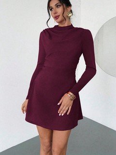 Styled front view of the burgundy draped mock-neck a-line dress, showing its silhouette and design details.