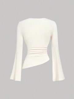 Garment back view of the ivory draped ruched asymmetric flared-sleeve top, showing the silhouette and fit.