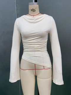 Mannequin front view of the ivory draped ruched asymmetric flared-sleeve top, showing the silhouette and fit.