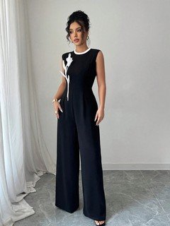 Full length front view of the black embroidered sleeveless wide-leg jumpsuit, showing the silhouette and fit.