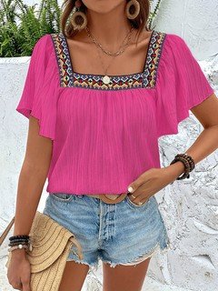 Front view of the fuchsia embroidered square-neck blouse, showing its silhouette and design details.