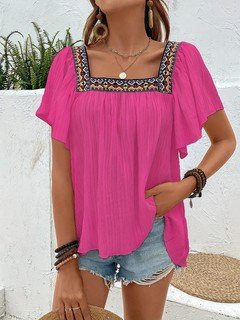 Full-length front view of the fuchsia embroidered square-neck blouse, showing its silhouette and design details.
