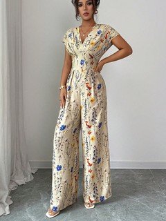 Angled front view of the cream floral wrap-front jumpsuit, showing its silhouette and design details.