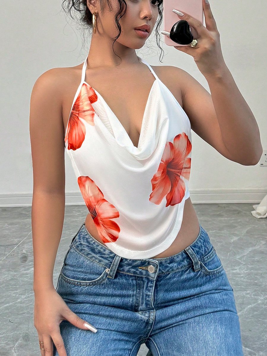 White And Orange Floral Cowl-Neck Halter Top – Front View Front view of the white and orange floral cowl-neck halter top, showing its silhouette and design details.