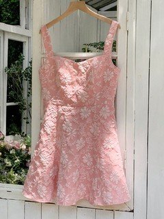 Garment front view of the pink floral-jacquard bow-back fit-and-flare mini dress, showing the silhouette and fit.